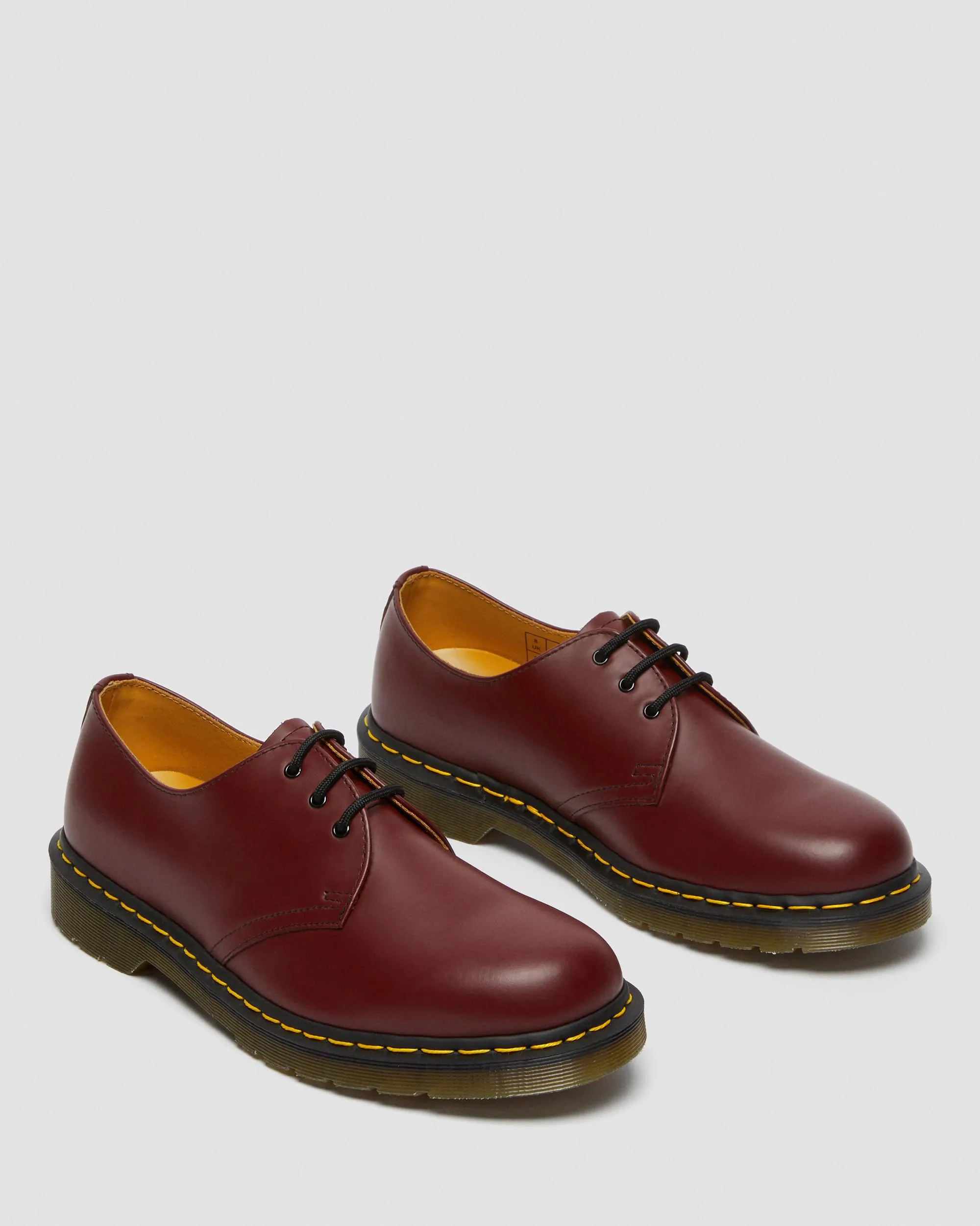 1461 Yellow leather oxfords with Dr stitching. Martens